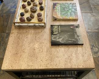 super nice , organic travertine & oiled bronze finish metal coffee table. Under side is metal wire shelf for storage