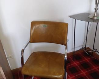 Leather chair chrome legs
Vintage