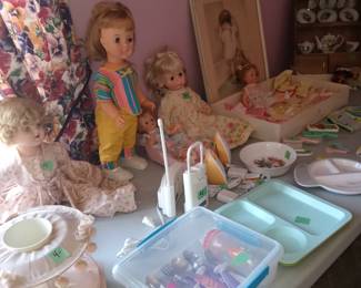 Vintage dolls, baby monitors, children plates and kids flatware