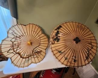 two vintage parasols