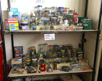 Jars full of assorted nails, screws, nuts, bolts, hooks. Priced by the jar full. Three vintage oil cans.