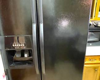 Whirlpool Refrigerator/freezer. Side by side, through the door water, finger proof finish.