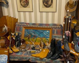 Western items displayed on wooden futon (under the cover)