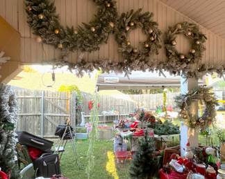 Several large Christmas wreaths'