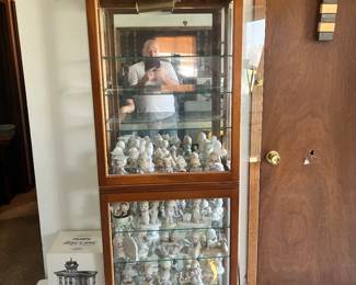 Large selection of Precious Moments figurines. Cabinet NOT for sale