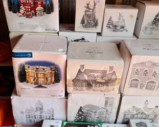 Assortment of Dept 54 and other Lighted Christmas village buildings and accessories 