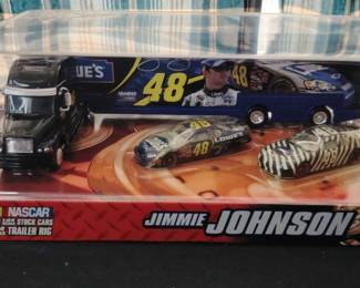 Unopened Jimmie Johnsons Winners Circle Car Hauler and Race Cars