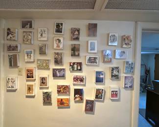Various framed cards and pictures