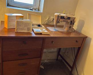 Vintage Sewing machine in cabinet witn accessories - machine needs repair