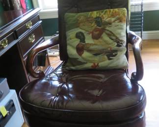 Handsome tufted fine leather chair with brass nail heads.