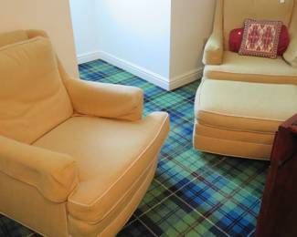 Comfortable chairs with ottoman.