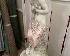 neoclassical statue and stand