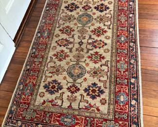 44. Cream and Red Wool Rug (3' x 5')