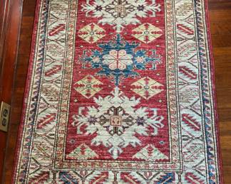 142. Red, Blue, and Tan Hand Knotted Rug w/ 3 Medallions (46" x 32")