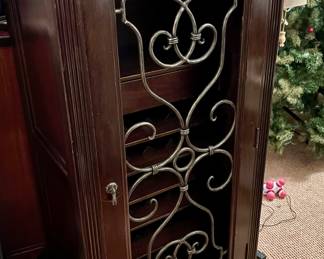 107. Cabinet w/ Metal Scroll Door (27" x 18" x 50")