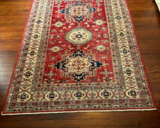 27. Red Wool Hand Knotted Rug (5' x 8')
