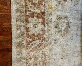 97. Gold Tone Wool Rug (143" x 173")