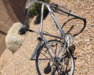 Fuji Sagres SE hybrid/commuter bicycle, likely late 1990s to early 2000s. It’s a lightweight aluminum frame bike, built for casual road and city riding, with upright handlebars and a rear rack.