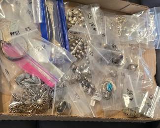 One flat full of sterling silver jewelry.