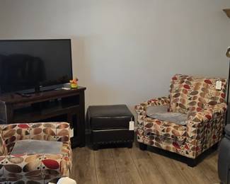 The two armchairs were well loved by a furry family member.  Someone was scratching to try and burrow down.  That is the reason for the rugs on their seats.