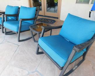 Patio chairs with Sunbrella cushions, 2 chairs are not in good condition.
