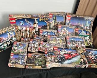 Harry Potter Lego sets lot, some partially assembled, boxes are empty, next two pictures show the box of legos that come with this lot