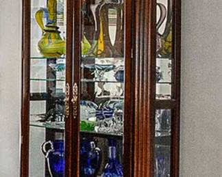 Cabinets of Murano and Swarovski Glassware