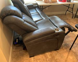 #13 Gray Leather Double Recliner w/side power button to raise feet while lowering head and a separate head adjustment - 82" Long - in excellent condition $1,000.00