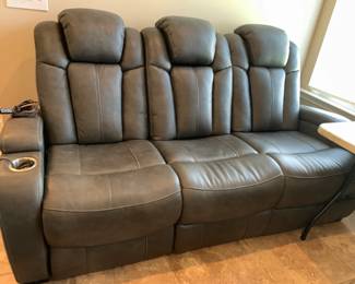 #13 Gray Leather Double Recliner w/side power button to raise feet while lowering head and a separate head adjustment - 82" Long - in excellent condition $1,000.00