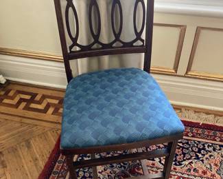 One of 4 folding chairs.
