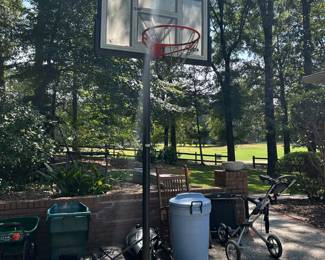 basketball goal, spreader, lawn cart