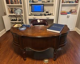 desk may be sold to homebuyer, desk chair, books, games