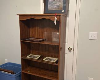 another bookshelf, exerciser, pictures