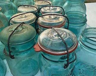 Large, medium, and small blue canning jars.