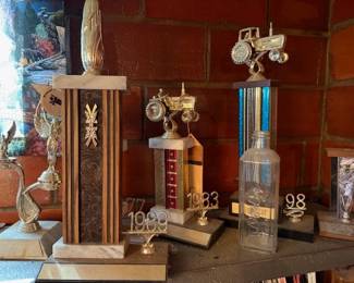 Farm, tractor pull trophies.