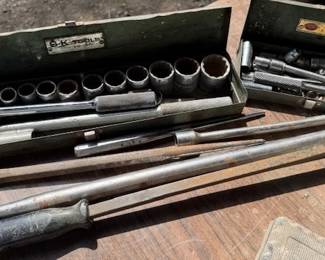 S-K sockets, wrenches. John Deere drift bar/punch. John Deere pry bar.