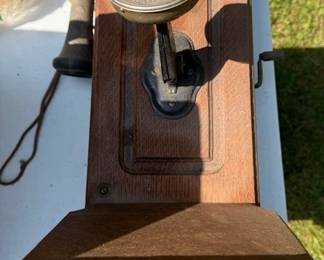 Oak case wall phones. Kellog.