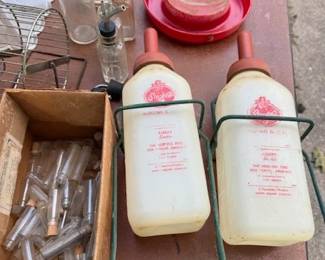 Small glass vials. Calf bottles.