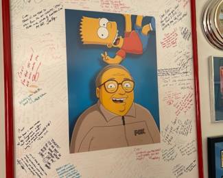 Signed by the cast and producers of The Simpsons