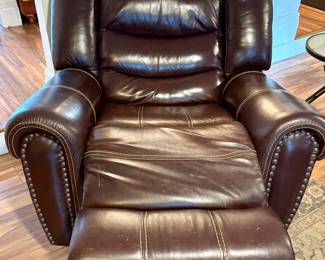 Dark Brown Leather Nail Head Rocking Recliner.