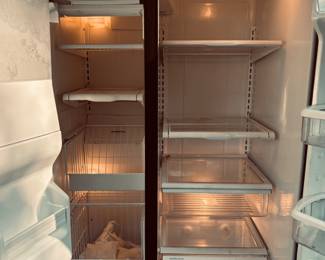 Large Whirlpool Gold Outdoor Refrigerator.