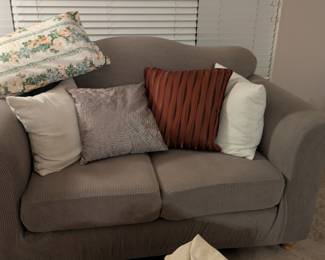 Love seat w/ Taupe cover. Misc pillows sold separately.