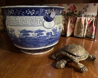 SOOOO good! She has a crack - but who cares...this large planter is amazing! The turtle is pretty neat too! 