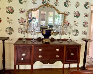 Stunning sideboard and Heisy crystal, antique plant stands and the prettiest mirror in the house!