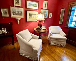 Custom club chairs in a soft linen color, Antique English game table, Drum tables, litho's from the 1800's...