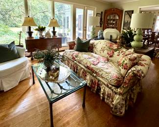 Super cool metal table, slip covered swivel chairs, incredible silverplate large trays, old and new lamp pairs...