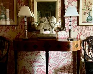 Chapman lamps, original watercolors, antique mirrors, Windsor chairs, garden statuary and a console table to die for!