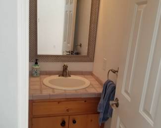 Rustic bath vanity; mirror