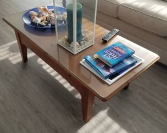 Coffee table; rug; lantern