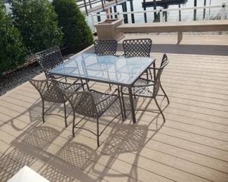 Glass top dining set seats 6; TREX decking